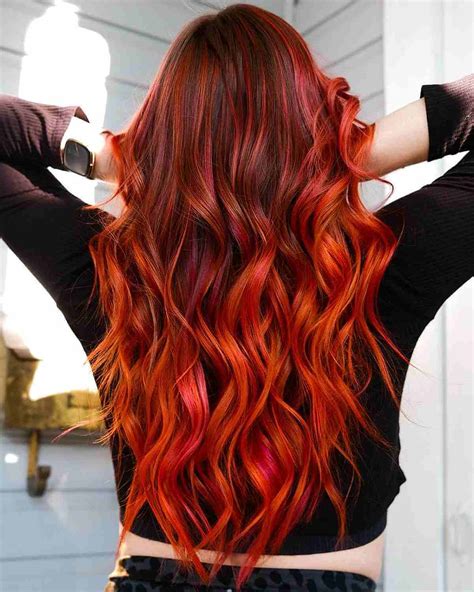 black hair bright red balayage